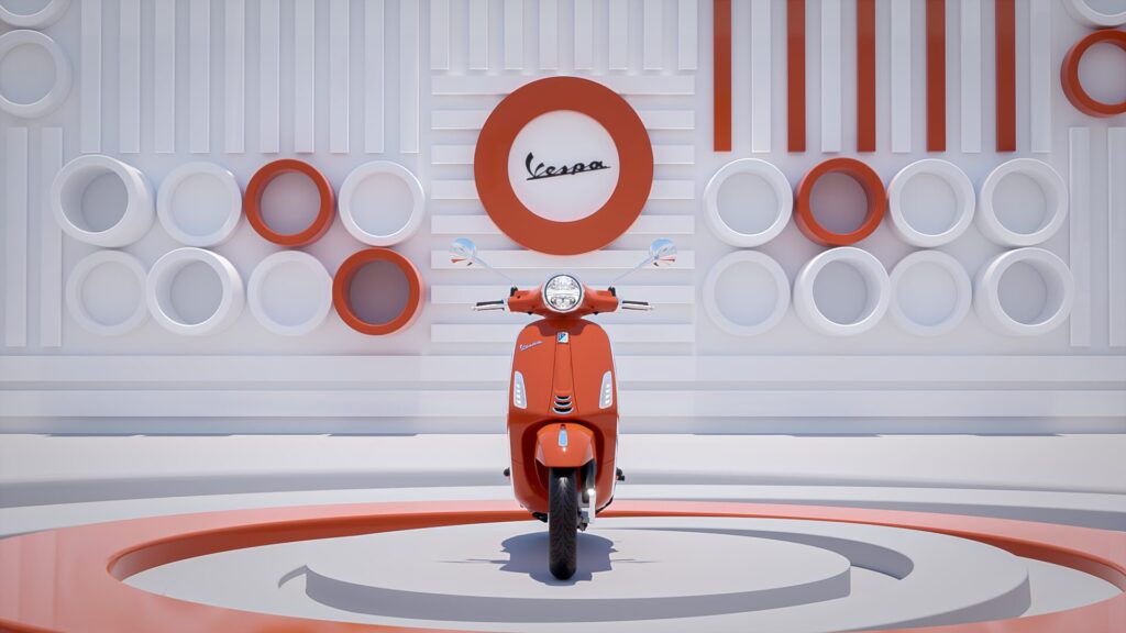 Rendering fotorealistico di una Vespa “Primavera” o “Sprint” in colore arancione, al centro di una scena stilizzata con elementi geometrici bianchi e arancioni.