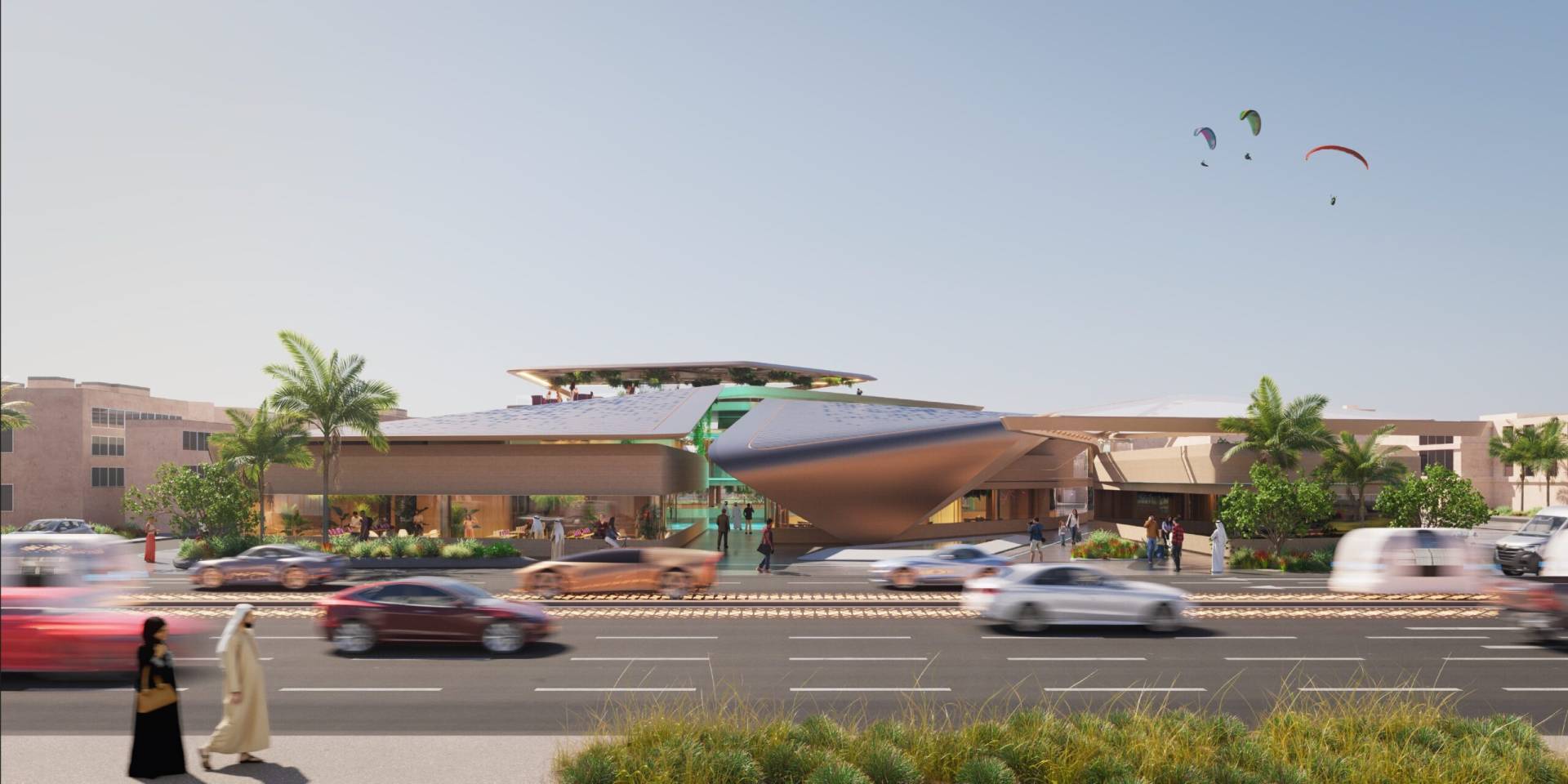 Rendering di un moderno edificio a Dubai, circondato da palme e attraversato da una strada trafficata. Persone camminano sul marciapiede in primo piano, mentre alcuni parapendii sono visibili nel cielo limpido